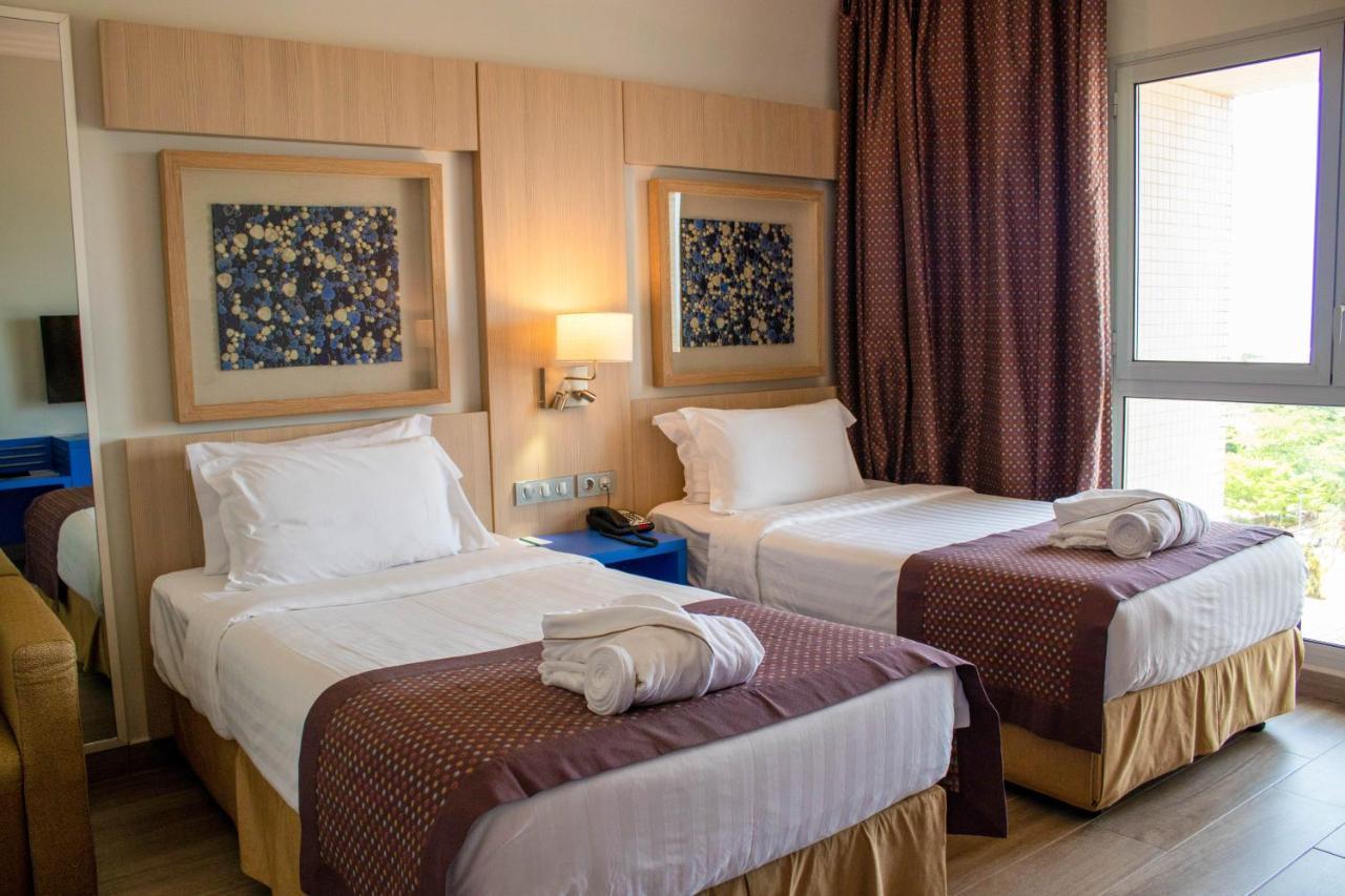 Отель Golden Tulip Le Diplomate Котону Экстерьер фото